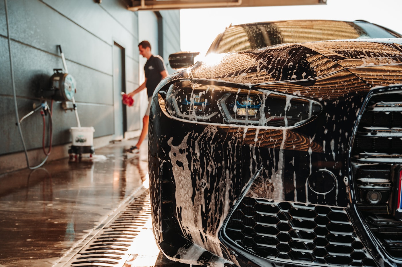 Sports car being detailed in a garage